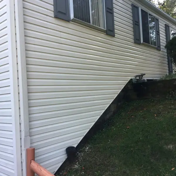 moldy house siding after soft washing monroeville, angle 1